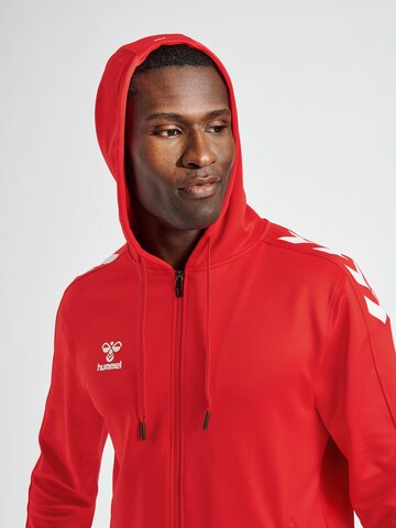 Hummel Sports sweat jacket in Red