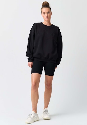 OCEANSAPART Sweatshirt 'Maya' in Black