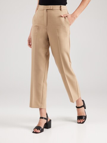 Coupe slim Pantalon à plis TOMMY HILFIGER en beige : devant