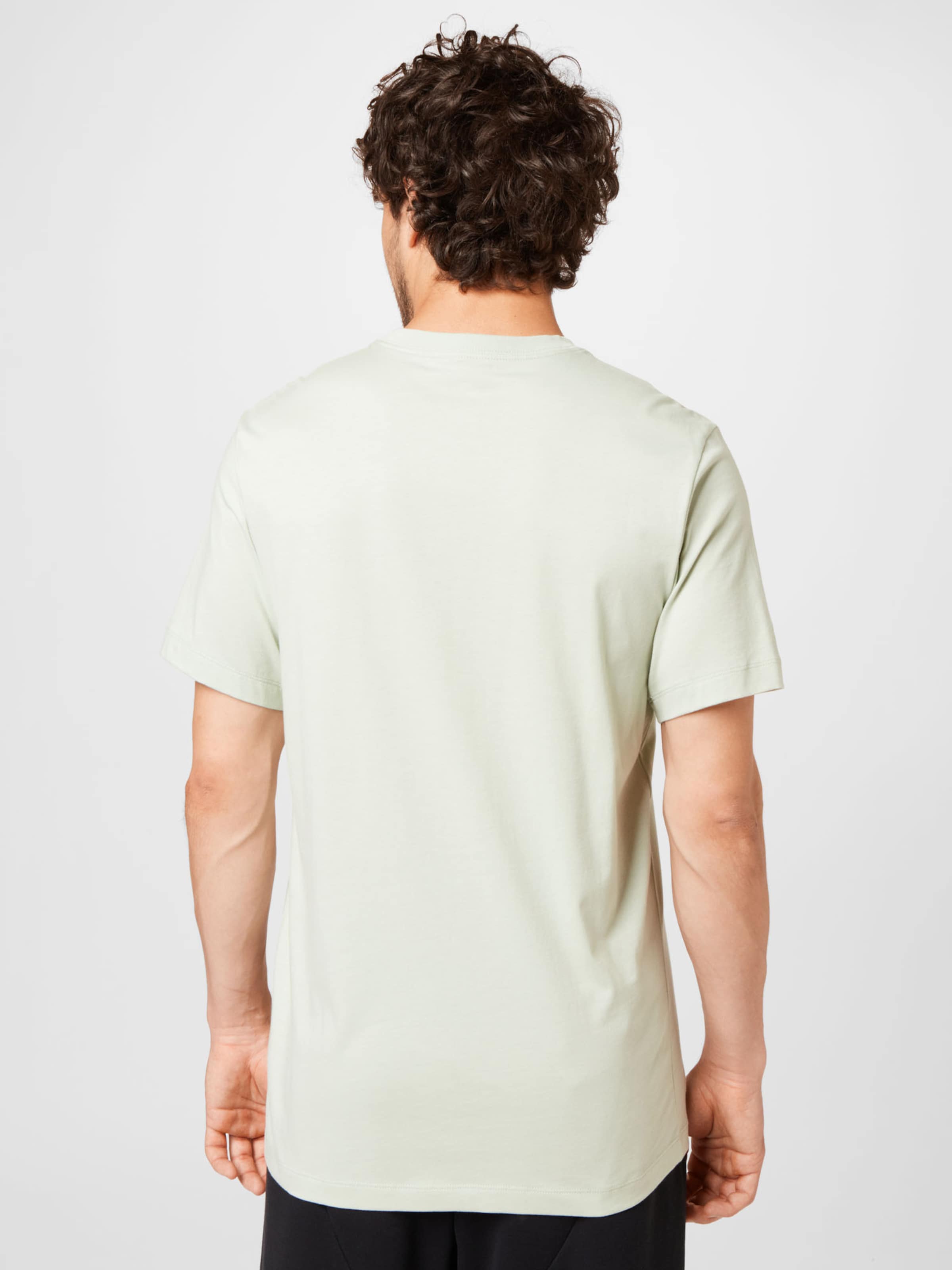 Männer Shirts Nike Sportswear T-Shirt in Pastellgrün - CJ82370