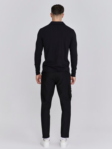 Loosefit Pantaloni cargo di SikSilk in nero