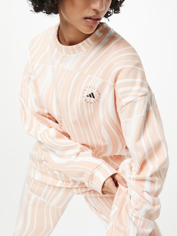 ADIDAS BY STELLA MCCARTNEY Athletic Sweatshirt 'Truecasuals Graphic' in Pink