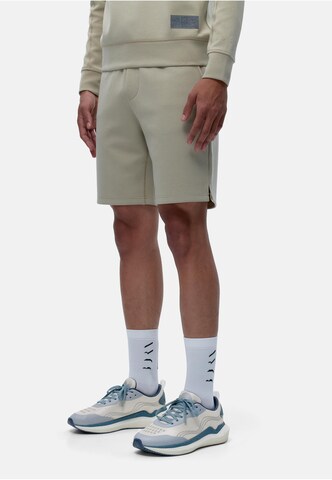 Born Living Yoga Regular Trousers 'Hughes' in Beige: front