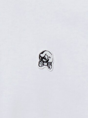 Unfair Athletics T-Shirt ' Punchingball Pin ' in Weiß