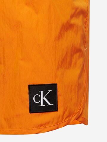 Shorts de bain Calvin Klein Swimwear en orange