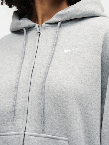 Nike Sportswear - Casaco em moletão em cinzento