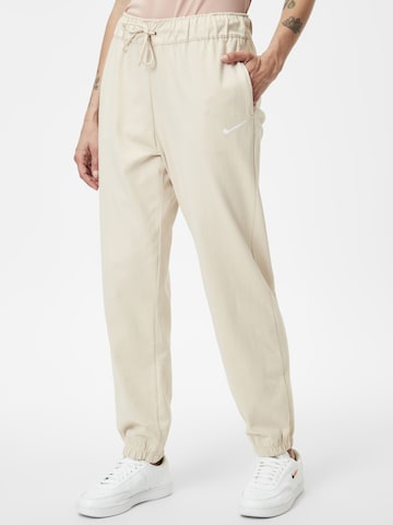 Effilé Pantalon 'Easy' Nike Sportswear en beige : devant
