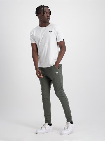 ALPHA INDUSTRIES Ozke Hlače | zelena barva