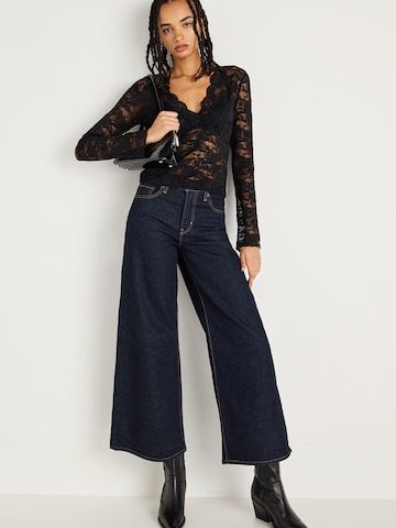 Tricou de la Gina Tricot pe negru