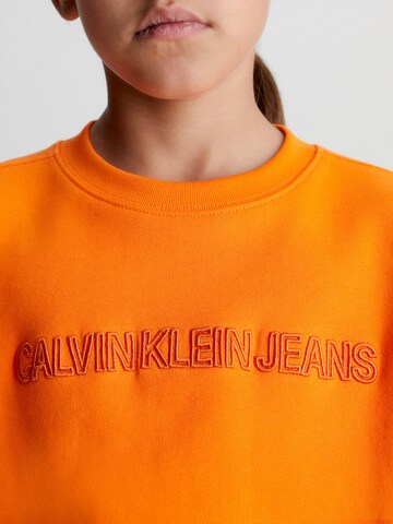 Calvin Klein Jeans Μπλούζα φούτερ σε πορτοκαλί