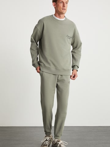 Grimelange Облекло за бягане в зелено