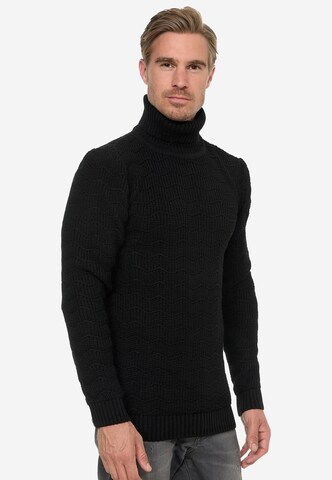 Rusty Neal Pullover in Schwarz: Vorderseite