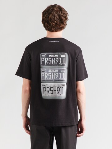 PUMA Bluser & t-shirts 'PL' i sort: forside