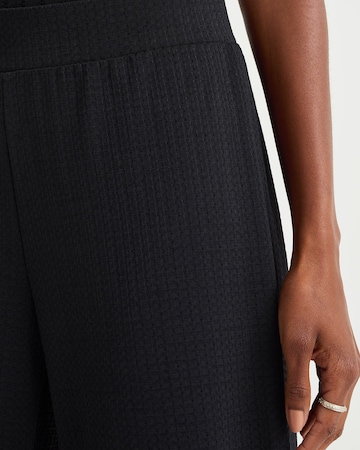 WE Fashion - Perna larga Calças em preto