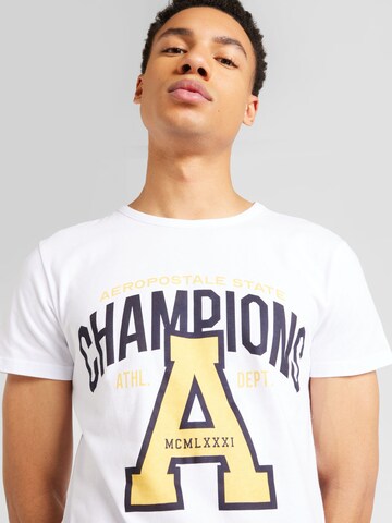 T-Shirt 'CHAMPIONS' AÉROPOSTALE en blanc