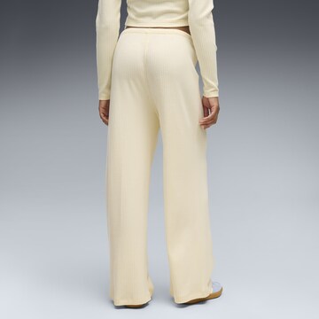 PUMA Wide leg Broek 'Essentials' in Geel