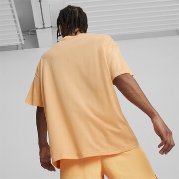 PUMA Тениска 'Classics' в оранжево