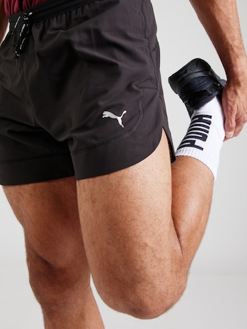 PUMA - Regular Calças de desporto 'Run Club 5 Ultraweave' em preto