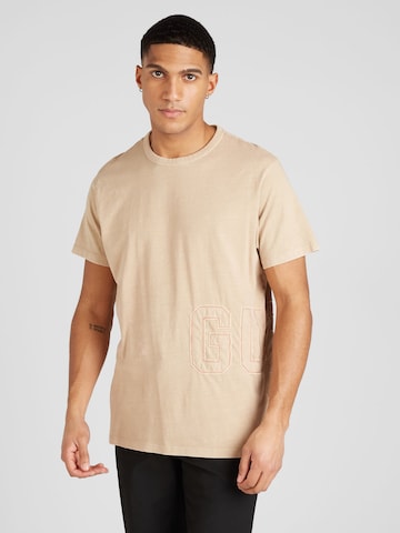 T-Shirt GUESS en beige : devant
