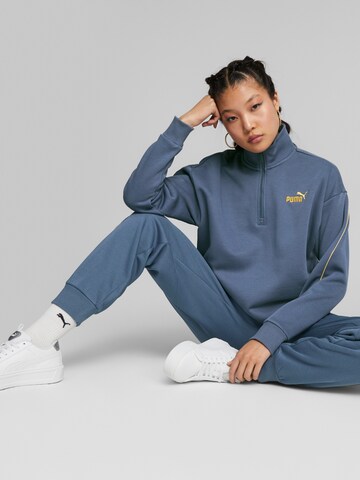 PUMA Sportief sweatshirt 'ESS+ MINIMAL' in Blauw
