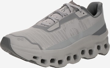 Scarpa da corsa 'Cloudmonster Void' di On in grigio: frontale