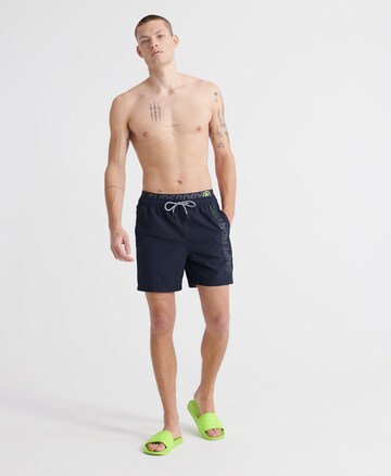 Superdry Regular Badeshorts 'State Volley' in Blau