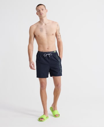 Superdry Regular Badeshorts 'State Volley' in Blau