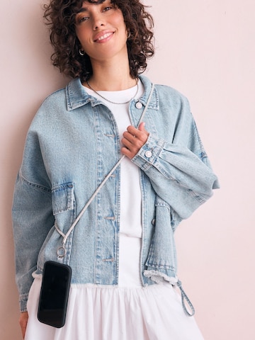 Next Handytrageriemen in Silber