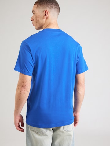 new balance - Camiseta 'Essentials' en azul
