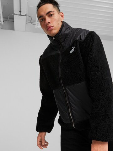 PUMA Between-Season Jacket in Black: front