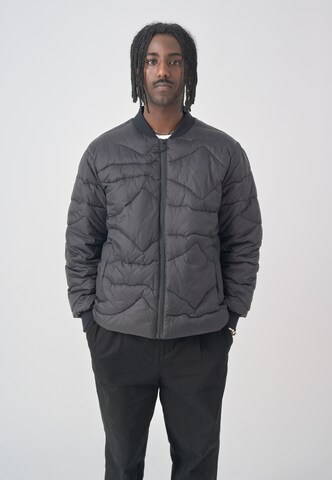 Cleptomanicx Winter Jacket in Black: front