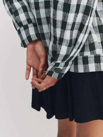 Next Tussenjas in Blauw