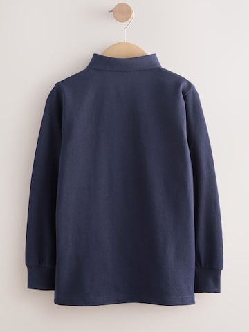 Tricou de la Next pe albastru