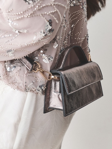 Borsa a mano di Next in bronzo