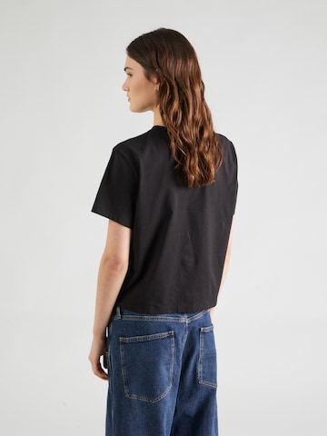 Tommy Jeans Koszulka 'ESSENTIAL' w kolorze czarny