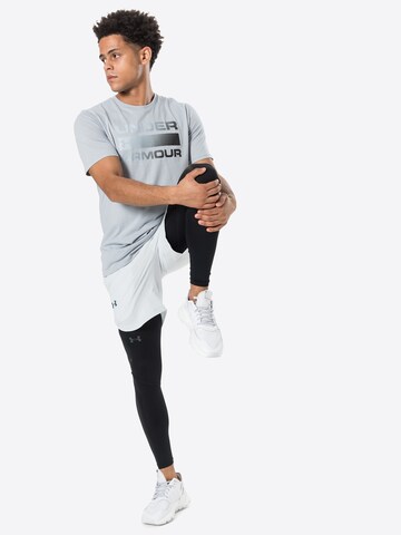 UNDER ARMOUR Skinny Παντελόνι φόρμας 'Rush' σε μαύρο