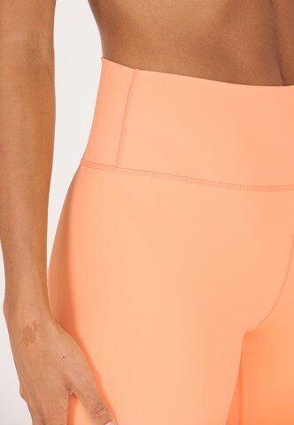 Athlecia Regular Sportbroek 'Bloom' in Oranje