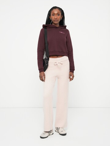 Nike Sportswear Szabványos Nadrág 'Phoenix' - rózsaszín