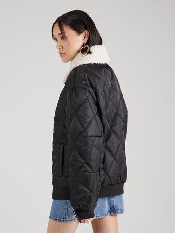 Hoermanseder x About You Between-season jacket 'Lucia' in Black