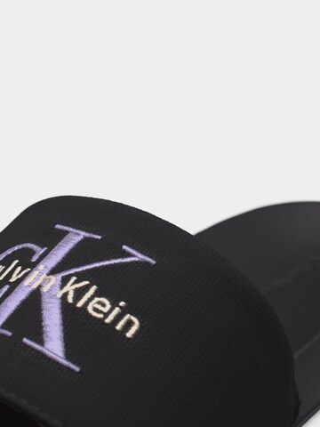 Calvin Klein Papucs 'ESS' - fekete