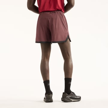 new balance Loosefit Sportbroek 'RC Essential Short 5"' in Bruin