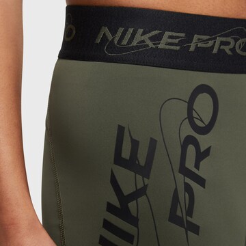 NIKE Skinny Workout Pants in Green