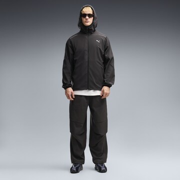 PUMA Winterjacke 'TECH' in Schwarz