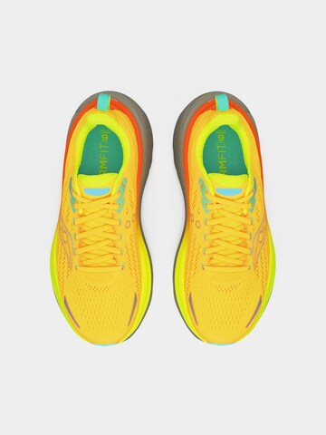 Chaussure de course saucony en orange