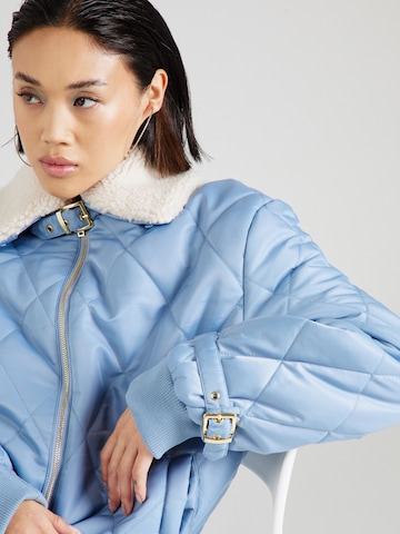 Hoermanseder x About You Between-Season Jacket 'Lucia' in Blue