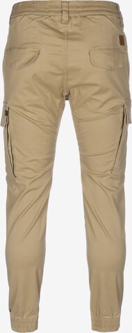 Effilé Pantalon cargo 'Airman' ALPHA INDUSTRIES en beige