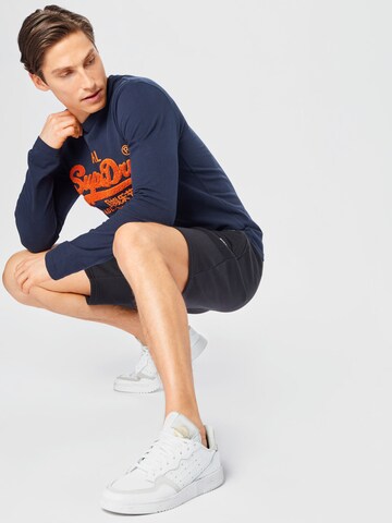 Superdry Normalny krój Spodnie sportowe w kolorze czarny