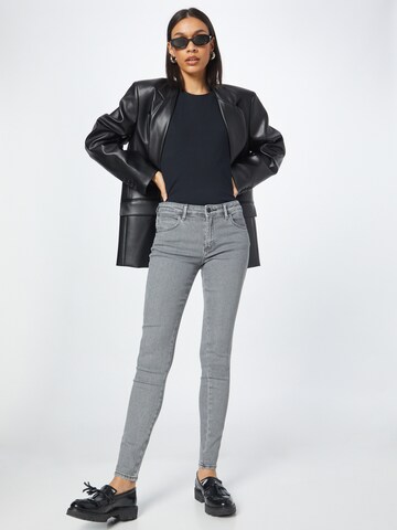 Skinny Jean WRANGLER en gris