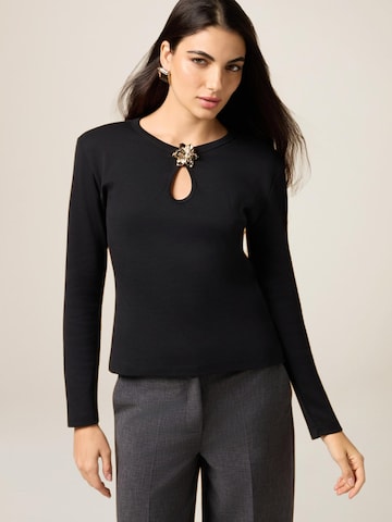 Maglietta di oltre in nero
