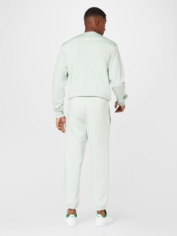 ADIDAS SPORTSWEAR Tapered Sporthose 'Essentials Feelvivid  Fleece Straight' in Grün